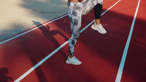 Workout. Unrecognizable female doing high knees running in place exercise Stock Footage 169377425