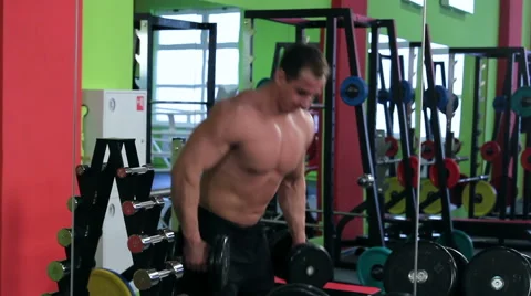 Workout for young bodybuilder. Alternated Biceps Curl Stock Footage 58052236