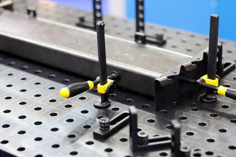 Workpieces on a welding table with clamps Stock Photos