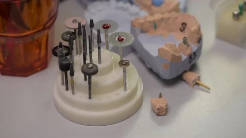 Workplace and tools of a dental technician in a dental laboratory 動画素材 169936046