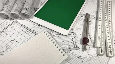 Workplace of the architect: architectural plans of the modern house - blueprints Stock Footage 94760563