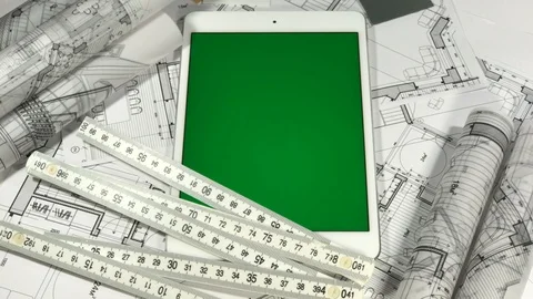 Workplace of the architect: architectural plans of the modern house - blueprints Stock Footage 96575844