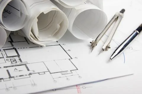 Workplace of architect - Architectural project, blueprints, rolls and tablet Stock Photos