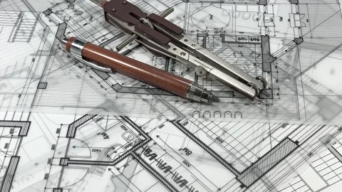 Workplace of the architect: blueprints, pencil, compasses / seamless looping Stock Footage 94127780