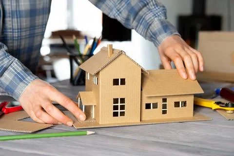Workplace of architect - construction drawings, scale model and tools. Modern Stock Photos