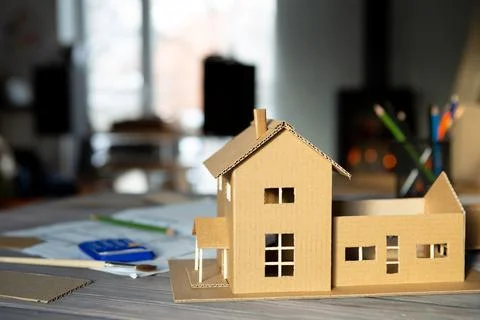 Workplace of architect - construction drawings, scale model and tools. Modern Stock Photos