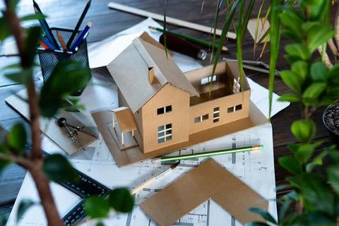 Workplace of architect - construction drawings, scale model and tools. Modern Stock Photos