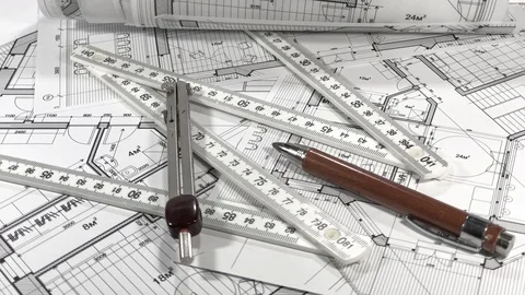 Workplace of the architect: rolls of architectural drawings - blueprints Stock Footage 94458100
