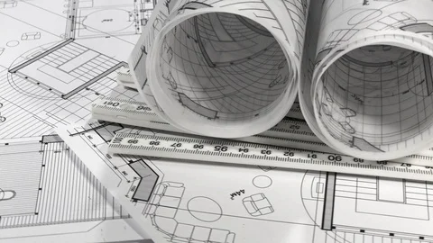 Workplace of the architect: rolls of architectural drawings - blueprints Stock Footage 94654413