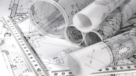 Workplace of the architect: rolls of architectural drawings - blueprints Stock Footage 94803561