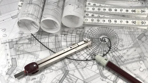 Workplace of the architect: rolls of architectural drawings - blueprints Stock Footage 94961994