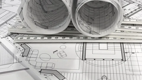 Workplace of the architect: rolls of architectural drawings - blueprints Stock Footage 94962675