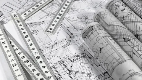 Workplace of the architect: rolls of architectural drawings - blueprints Stock Footage 94983496