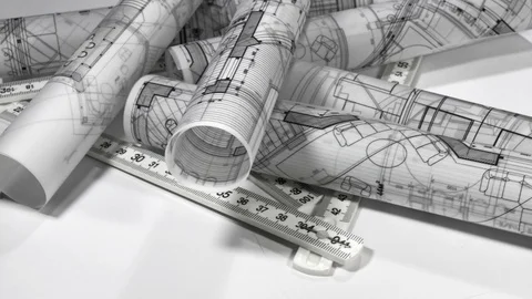 Workplace of the architect: rolls of architectural drawings - blueprints Stock Footage 95219967