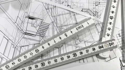 Workplace of the architect: rolls of architectural drawings - blueprints Stock Footage 95677093