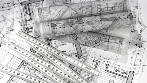 Workplace of the architect: rolls of architectural drawings - blueprints Stock Footage 95686758