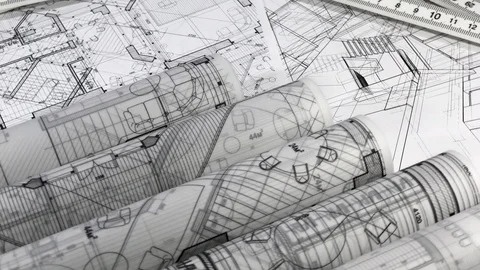 Workplace of the architect: rolls of architectural drawings - blueprints Stock Footage 96419082