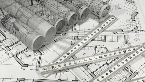 Workplace of the architect: rolls of architectural drawings - blueprints Stock Footage 96576724