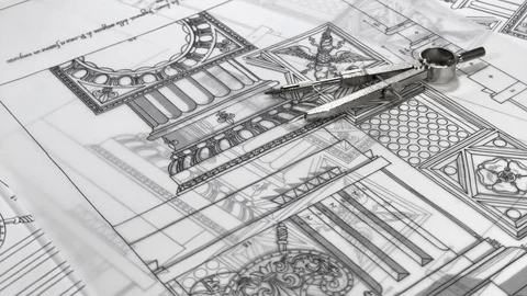 Workplace of the architect: rolls of blueprints, compass and drawings Stock Footage 94806800