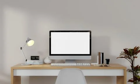 Workplace, computer with blank empty white screen display monitor on desk. Mock Stock Illustration