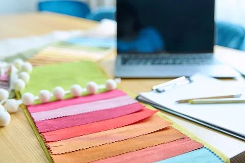 Workplace of designer, decorator, samples of fabrics and accessories recording Stock Photos