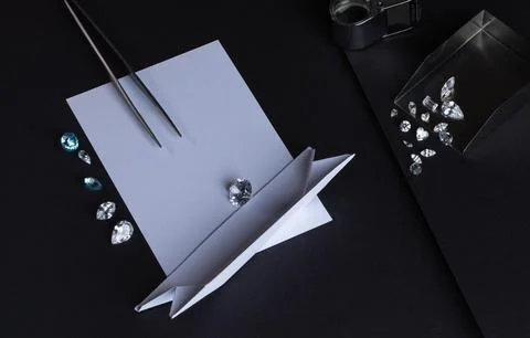 Workplace of diamond expert in the process of evaluating diamonds, top view Stock Photos