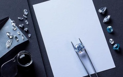 Workplace of diamond expert in the process of evaluating diamonds, top view Stock Photos