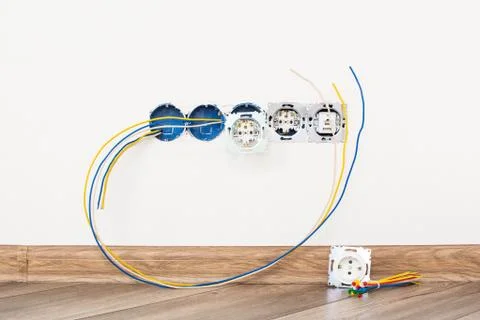 Workplace electrician. the process of installing sockets in the apartment 写真素材