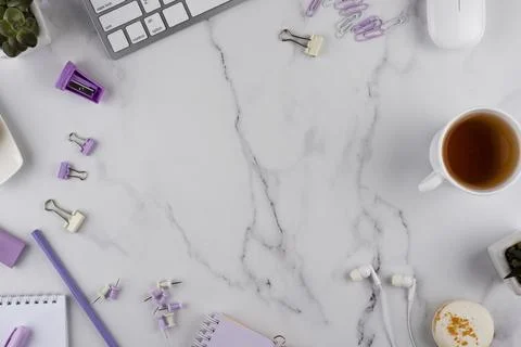 Workplace elements on marble table flat lay Stock Photos