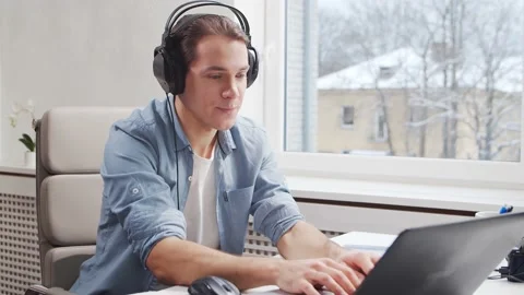 Workplace of freelance worker or sudent at home office. Young man works using Stock Footage 147029652