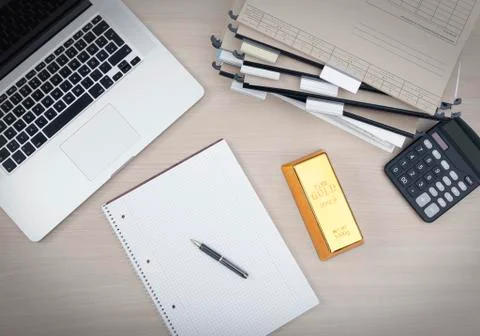 Workplace with a gold bar Photos