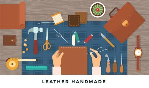 Workplace for handmade leather goods. Vector flat illustration. Table with tools Illustrazione stock