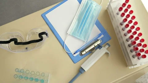Workplace of the laboratory assistant. On the table there are stands for test Stock Footage 129776611
