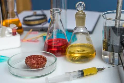 Workplace of a laboratory assistant, test tubes and laboratory equipment. Foo Stock Photos