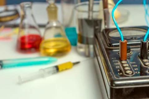 Workplace of a laboratory assistant, test tubes and laboratory equipment. Foo Stock Photos