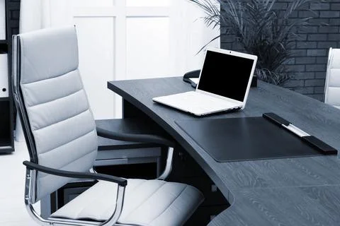 Workplace with laptop in office Stock Photos