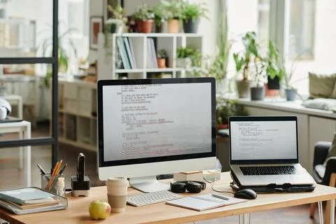 Workplace of modern IT support engineer with computers Stock Photos