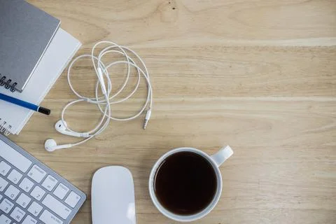 Workplace with notebook and keyboard, mouse on wooden table Foto stock