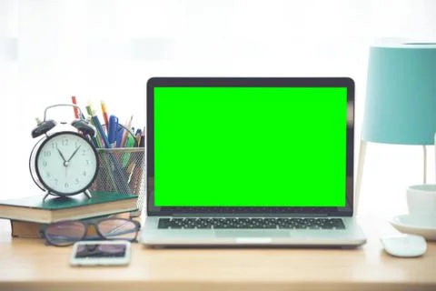 Workplace with notebook laptop Comfortable work table in office Foto stock