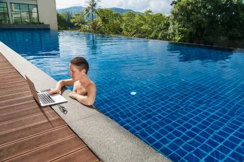 Workplace at the resort. Freelancer at work. Stock Photos