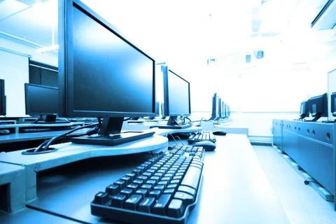 Workplace room with computers in row Stock Photos