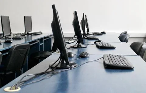 Workplace room with computers in row Stock Photos