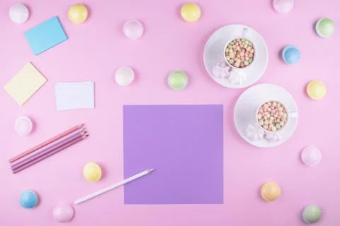 Workplace. Sheet of colored paper and pencils. Stock Photos