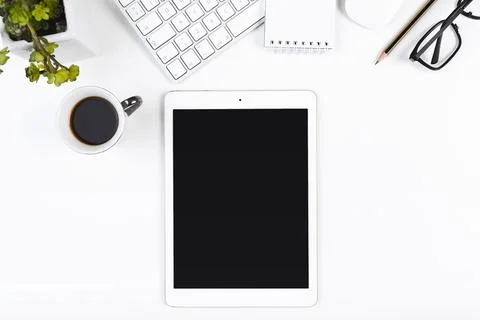 Workplace with tablet and coffee cup. High quality and resolution beautiful Stock Photos