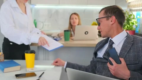 Workplace tense moment, professional refuses document anxiously, tense office Stock Footage 319566008