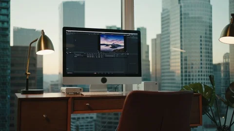 Workplace with view on Downtown LA, editing photos Stock Footage 127402231