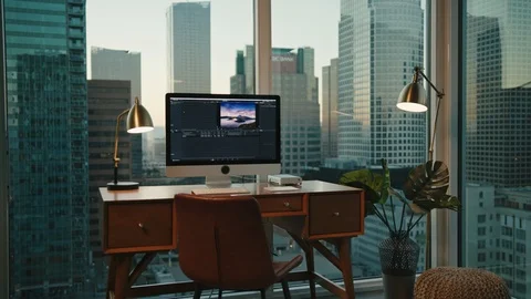 Workplace with view on Downtown LA, editing photos Stock Footage 127402232