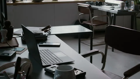 Workplace of Web Developer with Laptop, Headphones and Cup on Desk Video stock 299197136