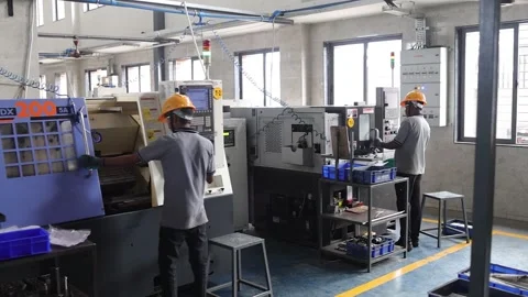 Works are work CNC machine in industry. Industry 5.0, industrial 4.0 concept Stock Footage 293453192