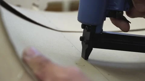 Works as an industrial stapler Stock Footage 267971698
